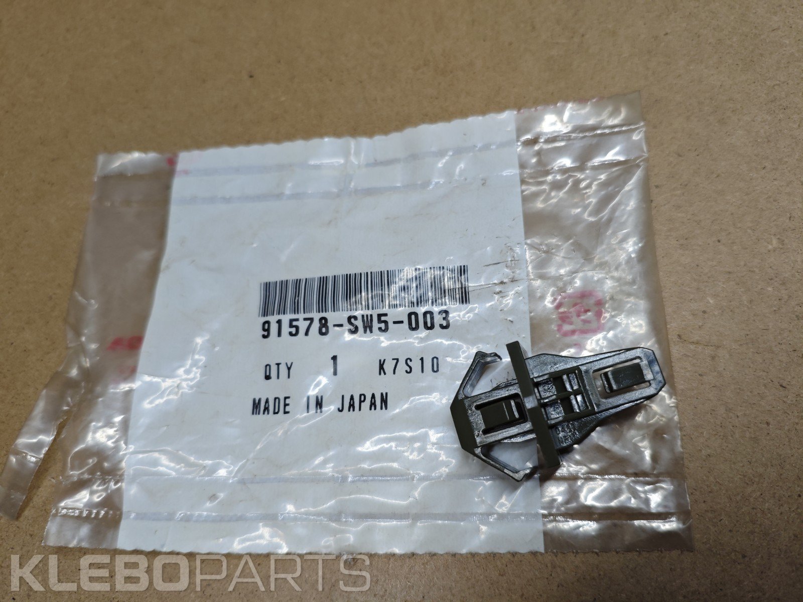 Honda Civic 2006–2011 priekinių grotelių plastikinis klipsas 91578-SW5-003 1 Honda Civic 2006–2011 priekinių grotelių plastikinis klipsas 91578-SW5-003