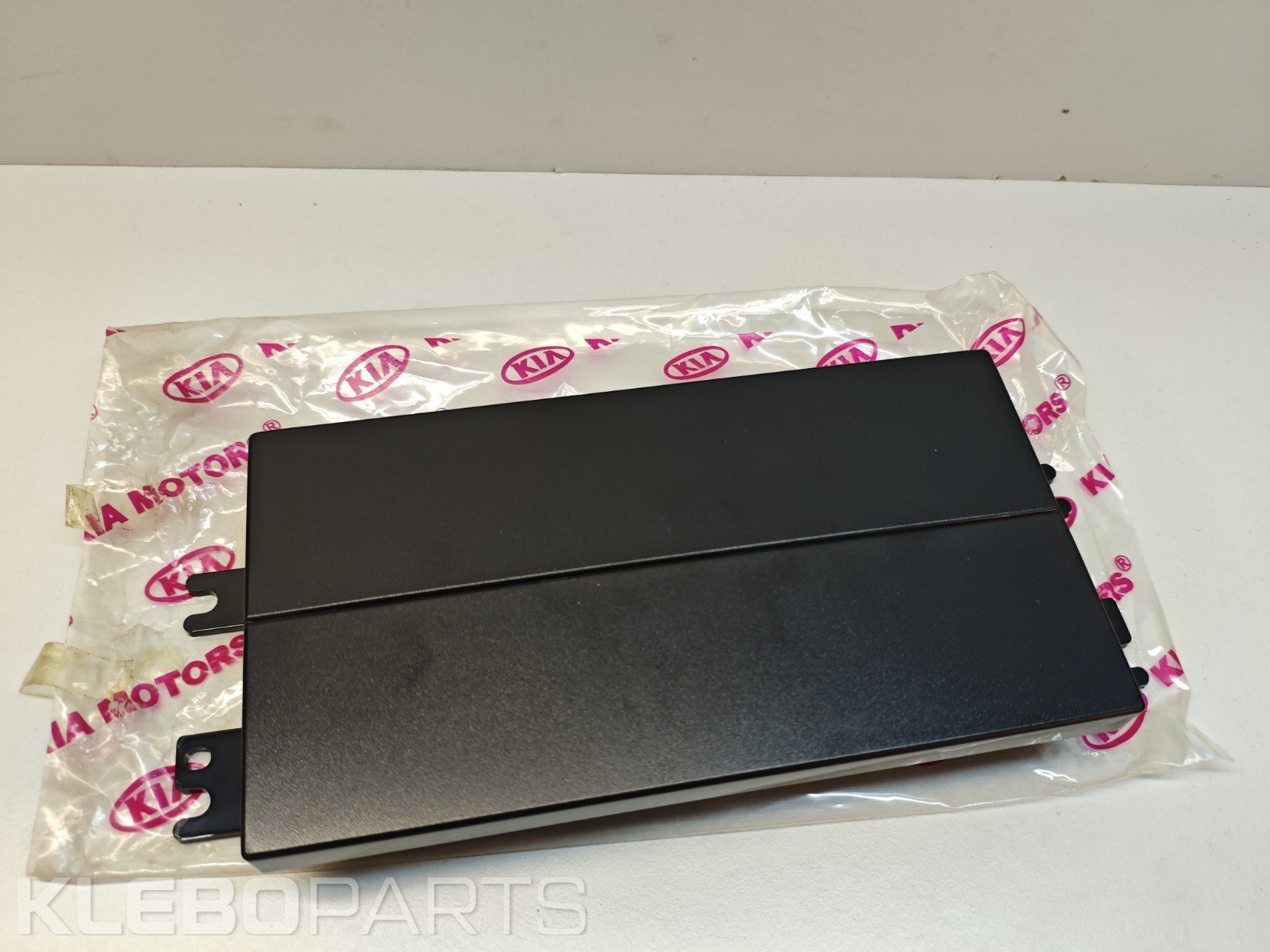 KIA Cerato Spectra 2004–2006 radijo angos uždengimo panelė 961162F000 1 KIA Cerato Spectra 2004–2006 radijo angos uždengimo panelė 961162F000