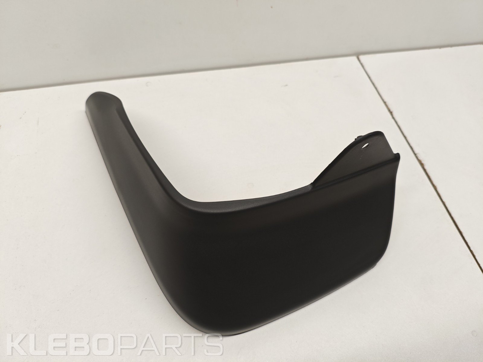 Honda Jazz 2005–2009 galinis kairys purvasargis OEM 1 Honda Jazz 2005–2009 galinis kairys purvasargis OEM